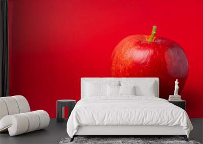 Red apple on a red background Wall mural