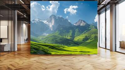 green land of mountains with blue sky in background Wall mural