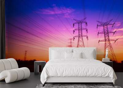 Electricity pylons at sunset Wall mural