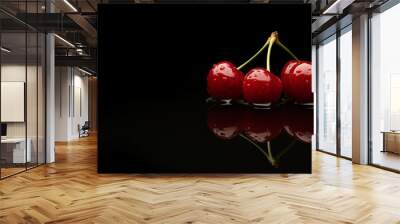 fresh red cherries on black background Wall mural