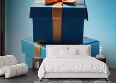 Two blue gift boxes with gold bows on blue background, AI Wall mural