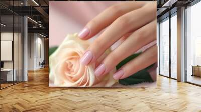 Female hands with pink nail design Wall mural