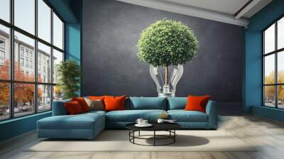 Innovative light bulb concept with a lush green tree symbolizing sustainability and eco-friendly energy solutions. Wall mural