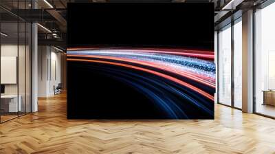 A long-exposure photograph of light trails on a black background, symbolizing fast digital data transfer in a network.  Wall mural