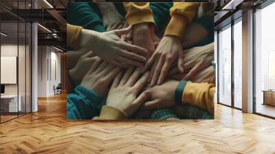 A vibrant gathering of hands, signifying unity and camaraderie, in a warm huddle full of hope and togetherness. Wall mural