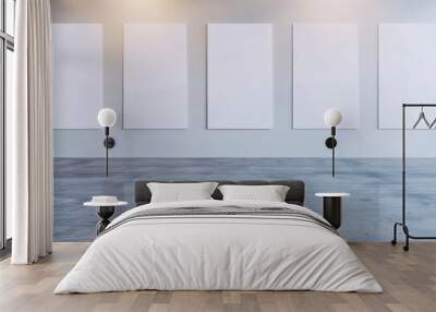 An art gallery room with five blank canvases arranged against a clean, white wall, ready for creative expression and artistic exploration. Wall mural