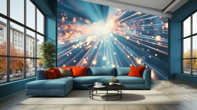 An explosion of light particles radiating outward, showcasing dynamic movement and energy, evoking themes of creativity and technological innovation. Wall mural