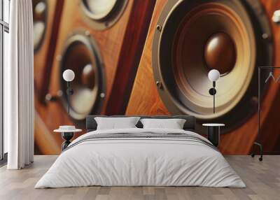 Rustic wooden speakers aligned in a series showcase their vintage appeal, highlighting the elegant design and sophisticated audio technology they represent. Wall mural