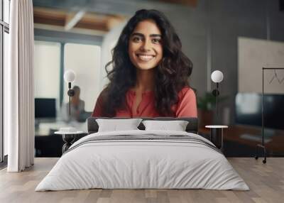 Smiling Oriental Woman Posing in Office. Positive Female Worker Smiling at Camera Wall mural