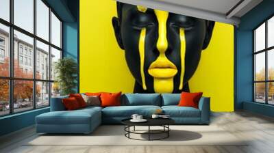 A portrait of a woman with black body paint and dripping yellow paint, expressing themes of sadness, art, and individuality.  Wall mural