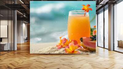 A tropical fresh juice background featuring a glass of papaya juice, garnished with papaya slices and tropical flowers, placed on a sandy beach surface Wall mural