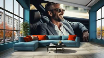 Attractive elegant happy man in good car. Wall mural