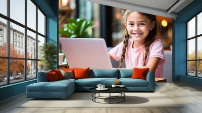 Cute little girl using laptop at home, Education, online study, home studying, distance learning, homework, schoolgirl children lifestyle concept. Wall mural