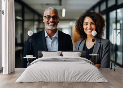 Happy confident business team people two Latin and African American colleagues standing in office Wall mural