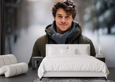 Portrait of a young man with a cup of hot chocolate on the background of the winter forest Wall mural