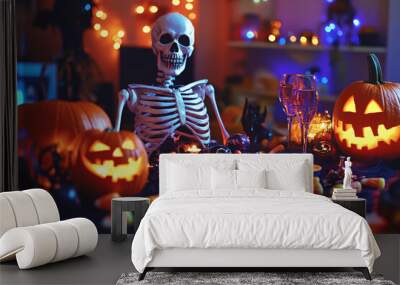 A Halloween party setup with candy corn, skeleton decorations, and glowing pumpkins on the table. Wall mural