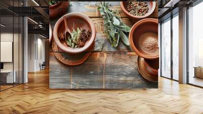 A rustic table setting with a variety of spices in clay bowls. The earthy tones and natural textures of the spices and tableware create a warm and inviting culinary scene. Wall mural