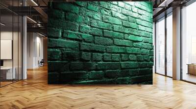 A dimly lit brick wall illuminated in green casts an atmospheric glow over its textured surface Wall mural