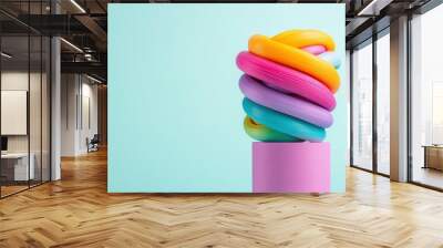 Abstract Rainbow Shapes on Pastel Blue Background Wall mural