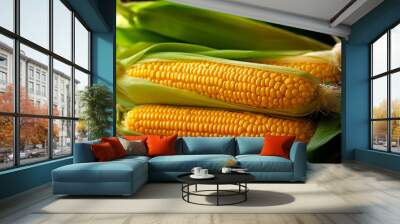 a close up of two corn on the cob on a cloth surface with leaves and a bulb of bulb Wall mural