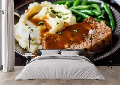 Enjoy a hearty, homemade meal with juicy slices of meatloaf smothered in savory gravy, served alongside creamy mashed potatoes and green beans Wall mural