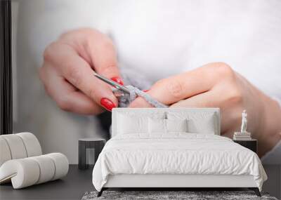 female hands knitting close up Wall mural