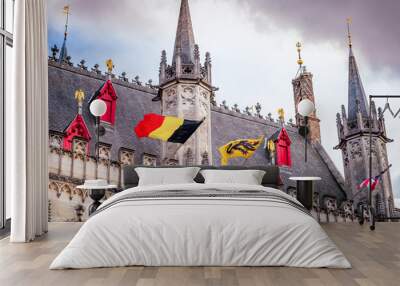 Belgian flags, flemish architecture in Bruges market square Wall mural