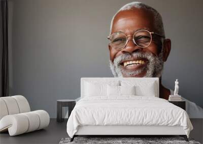 elderly middle aged African man smiling isolated Wall mural