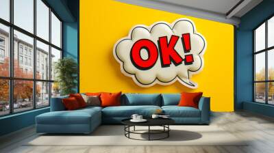 ok word in comic speech bubble style with explosion in pop art on trendy yellow background Wall mural