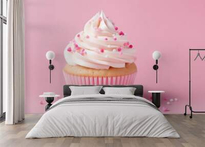 Vanilla cupcake with cream cheese frosting and pink sprinkles on a pink background. Valentine's Day or birthday dessert. Generative AI Wall mural