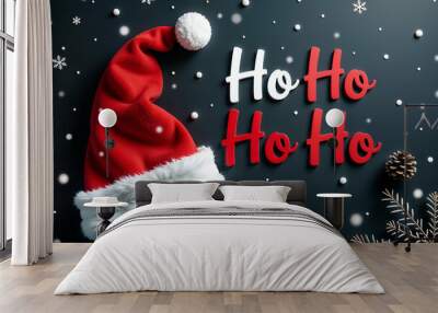 Santa hat with cheerful ho ho ho on a black background Wall mural