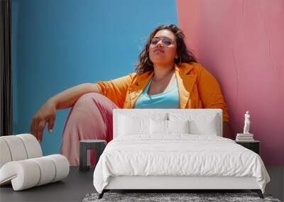 beautiful fashion plus size woman sitting on color wall, generative ai Wall mural