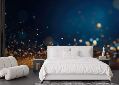 Blue and Gold Glistering Background with Holiday Shine. Abstract Blue and Gold Particles Bokeh on Navy Blue Background. Golden Light and Foil Texture. Wall mural