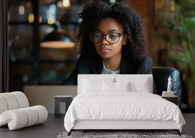 Business Serious. Black Woman in Office Reviewing Project with Laptop, Idea and Focus Wall mural