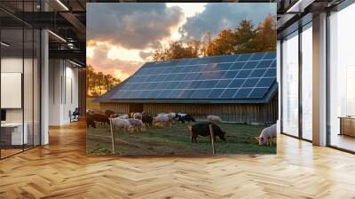 A picturesque scene of a farm with solar panels on the barn, showcasing sustainable farming practices as pigs graze peacefully in the field during a beautiful sunset. Wall mural