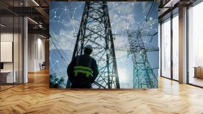 A silhouette of a futuristic maintenance engineer stands in front of a power grid, highlighting the interconnectedness of modern energy infrastructure. Wall mural