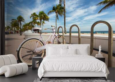 A lady bike parked next to t Fort Lauderdale Beach, Florida Wall mural