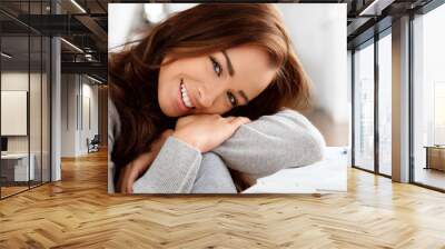 Close-up portrai of an attractive young woman smiling Wall mural