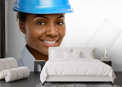 Happy African AMerican business woman architect holding blueprin Wall mural