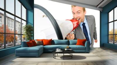 Happy young bussinessman shouting with megaphone on white backgr Wall mural