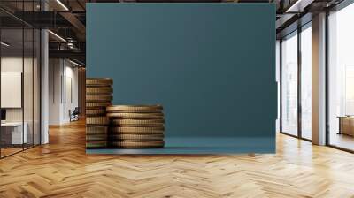 Stacks of gold coins arranged in increasing height representing financial growth and savings Wall mural