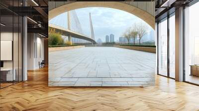 Empty square floor and bridge with skyline scenery at sunset. Empty square floor and bridge with modern city buildings. Wall mural