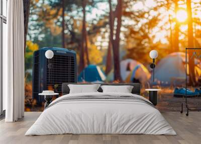 A small portable air conditioner sits in the middle of a campsite. The air conditioner is surrounded by tents and a few people are scattered around the area. Generative ai illustration. Wall mural