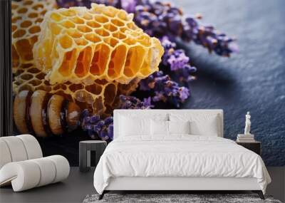 Honeycomb paired with lavender flowers on a dark background creating a delightful culinary presentation Wall mural