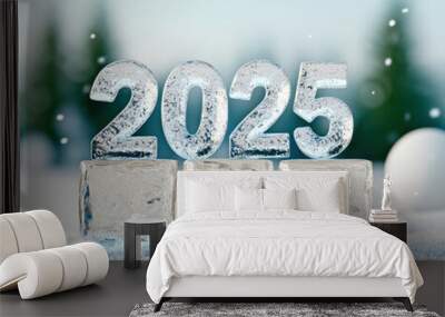 Crystal clear ice cubes form year 2025, set against snowy backdrop with soft green trees. This captures serene winter atmosphere, perfect for celebrating new year Wall mural