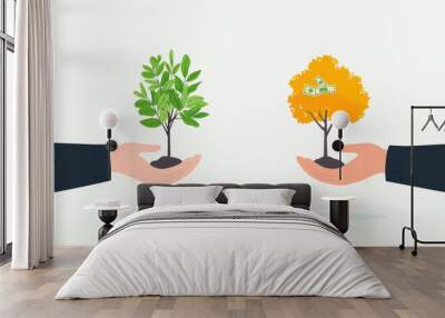 visual representation of balanced hands holding two trees, one green and vibrant, symbolizing growth, and other golden with money, representing wealth. This conveys harmony between nature and Wall mural