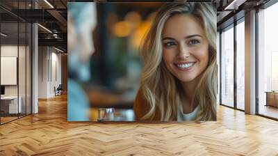 Woman smiling at man during a date Wall mural