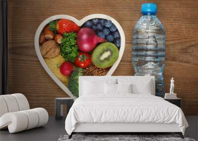 Healthy food in heart shaped bowl Wall mural