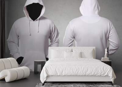 Set of stylish white hoodie sweater with anonymous black manequin on grey background, front and back view. Copy space mock up template Wall mural