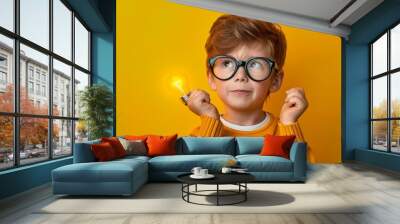  little boy with wearing glasses on yellow background  Wall mural